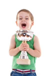 Child with trophy